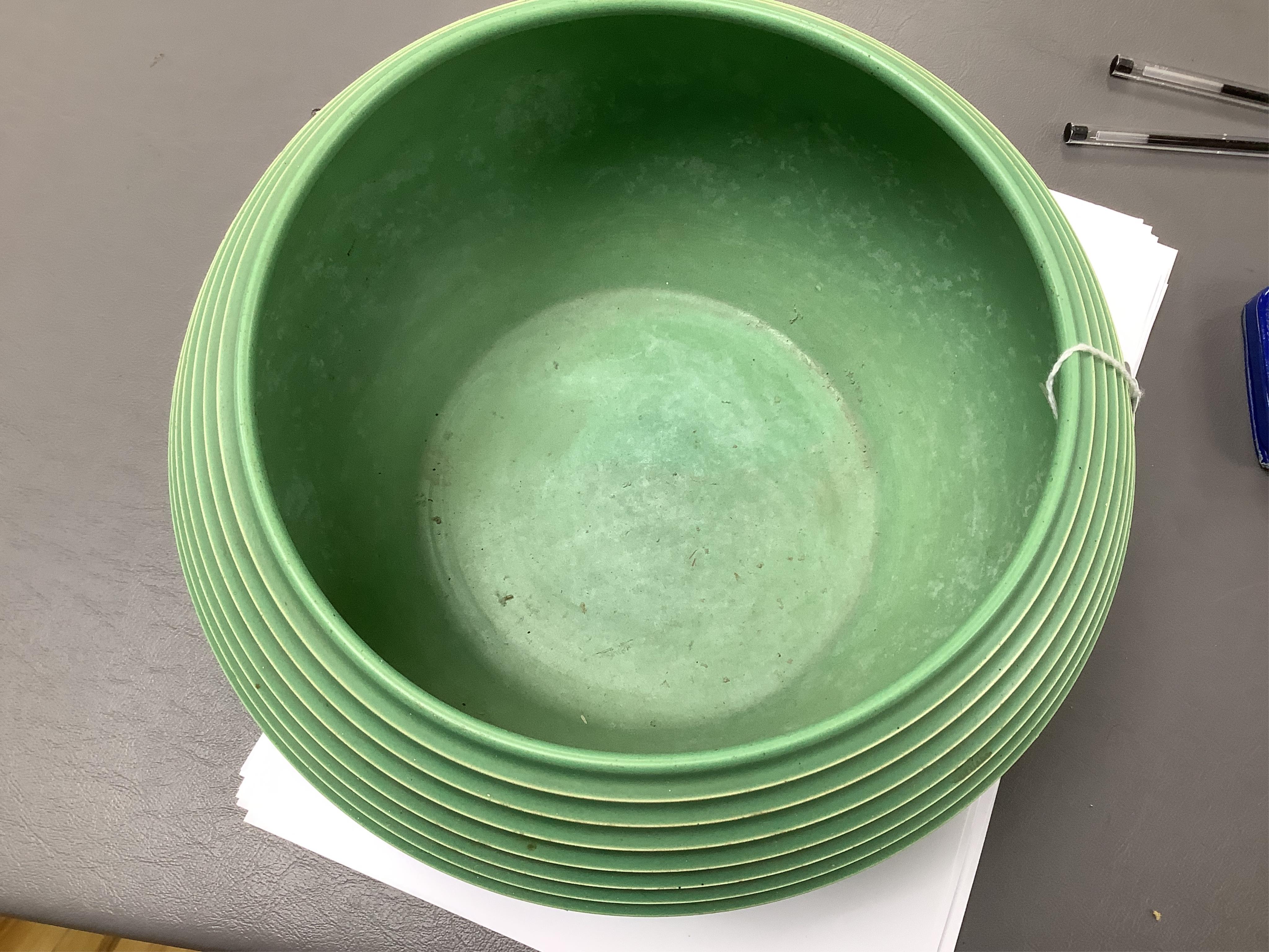 Keith Murray for Wedgwood green glazed ribbed bowl, signed and stamped to the base, 25cm in diameter